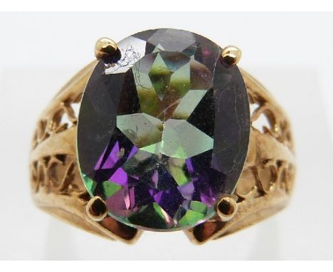 A 9ct gold ring set with a treated topaz with pierced shoulders, size J/K, 4.4g  