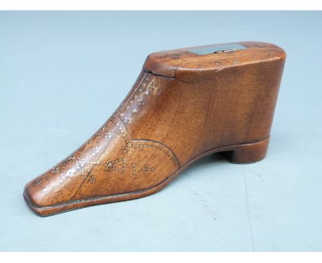 An 18th / 19thC carved mahogany / fruitwood treen snuff box in the form of a shoe with inlaid metal thumb piece, hammered inl
