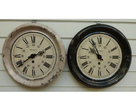 Newgate enamel quartz wall clock in black surround with Roman hours and Arabic 24 hours together with a further example in mu
