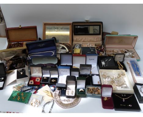 A large collection of costume jewellery including beads, brooches, earrings, Christian Dior glasses etc 