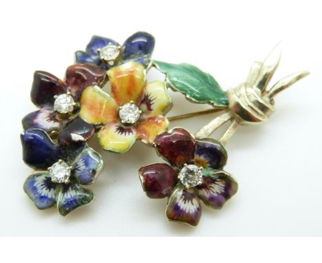 A 14k gold brooch in the form of a posy of pansies set with enamel and diamonds to the centre 