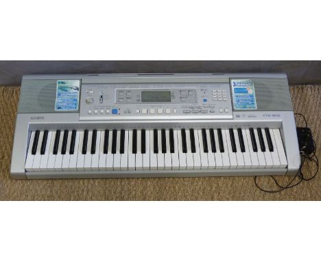 Casio CTK-810 keyboard with AC adaptor 