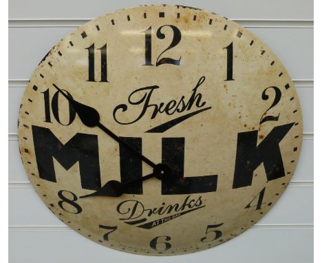 A caseless quartz dial wall clock with 'Fresh Milk Drinks at the Bar' advertising slogan to the distressed finish convex enam