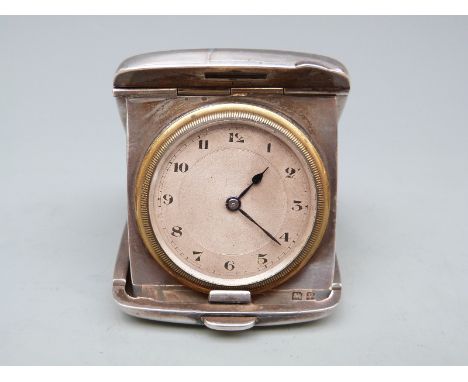 George V hallmarked silver travelling clock in fold out case, with keyless wind Swiss watch type movement, Birmingham 1920 ma