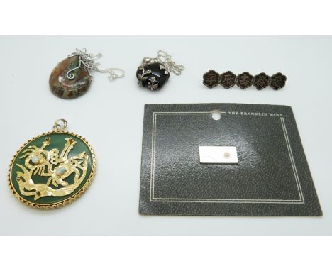 A Chinese silver brooch marked KW, an azurite pendant set with opals, fossil pendant and Franklin Mint opal 