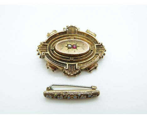 A Victorian brooch set with a ruby and pearl and a yellow metal brooch set with enamel flowers 