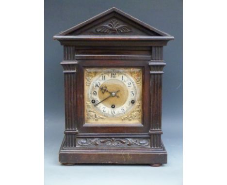 German c1910 mantel or bracket clock in mahogany architectural-style case with reeded square columns and light carving, the g
