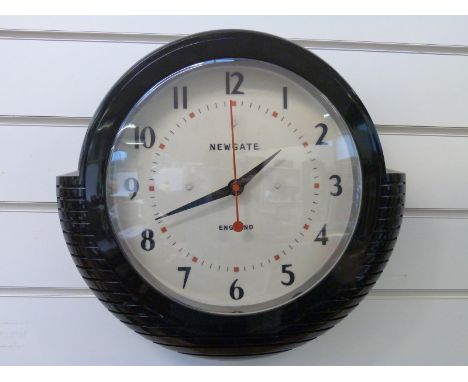 Newgate Deco style quartz wall clock with Arabic numerals, red seconds sweep, black case and 25cm dial 