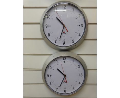 Two Alba quartz dial wall clocks with Arabic numerals and red seconds sweep