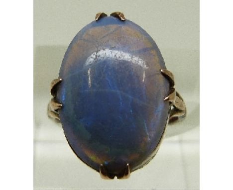 A Victorian 18ct gold ring set with a black opal cabochon, size I, 3.7g. 