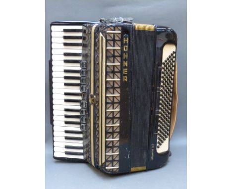 Hohner Atlantic III 120 bass piano accordion, 9 treble and 3 bass couplers, in black lacquered finish, with case