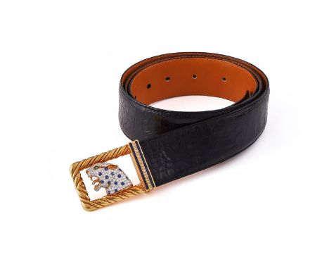 Y A SAPPHIRE AND DIAMOND SET BELT BUCKLE The leopard's head pavé set with brilliant cut diamonds, with circular cut sapphire 