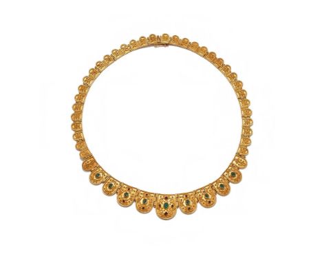 A RUBY AND EMERALD SET NECKLACE Of graduated panel design with ropetwist and beadwork decoration, the front set with cabochon