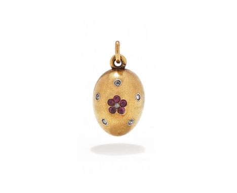 A RUSSIAN GEM SET EGG LOCKET PENDANT Modelled as an egg, inset to each side with a cabochon ruby and rose cut diamond flowerh