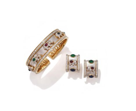 A GEM SET TORC BANGLE AND EARRINGS  The sprung bangle with brushed ground applied with pavé set brilliant cut diamond elephan