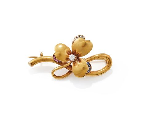 AN EARLY 20TH CENTURY GEM SET CLOVER BROOCH CIRCA 1900  The polished three leaf clover with graduated rose cut diamond, ruby 