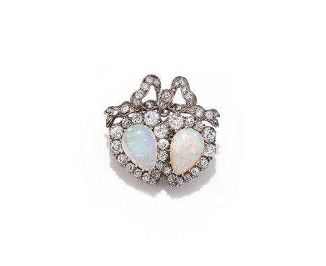 AN OPAL AND DIAMOND DOUBLE HEART BROOCH/PENDANT  CIRCA 1900 Set with two pear shaped cabochon opals within an old European cu