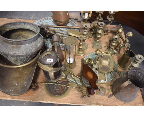 A large quantity of various metal wares To include a grass log holder, a large wall charger, a hunting horn, various fire iro