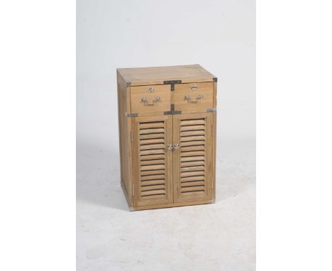 A modern light oak cabinet Having two drawers, each applied with angular swing handles above a pair of louvre doors, applied 