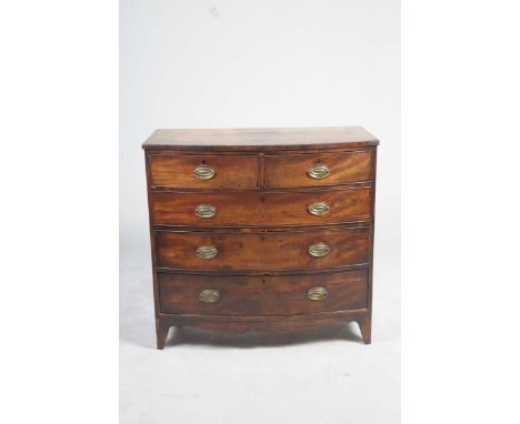 An early 19th Century mahogany bowfront chest of drawersWith an arrangement of two short and three long graduated cock beaded