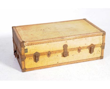 A vintage early 20th Century pigs skin and metal mounted steamer trunk made by WatajoyThe ivory coloured pig skin within stud