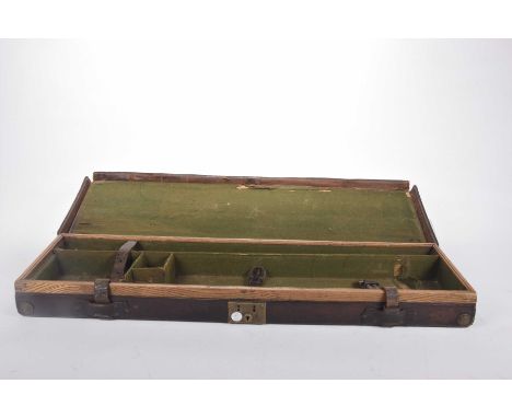 A late 19th/ 20th Century tan leather shotgun caseThe tan leather adorned with exposed stitching and brass metal ware detaile