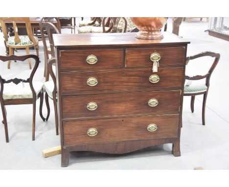 An early 19th Century mahogany chest of drawersWith two short and three long graduated drawers each applied with embossed ova