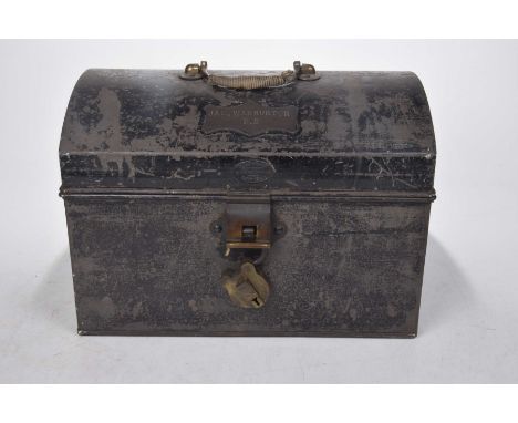 A black painted domed metal security trunk, late 19th CenturyThe domed lid with brass handle, label owner JAS Warburton, D.B,