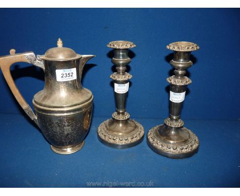 An Epns Coffee Pot with wooden handle and a pair of silver plated Candlesticks