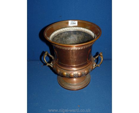 A 10" Copper two-handled Urn.