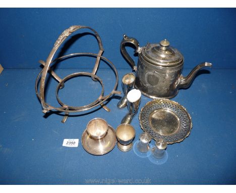 A quantity of silver plate including teapot, egg cups, two boots, etc.