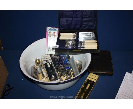  A quantity of vintage Cutlery including boxed teaspoons in enamel bowl.