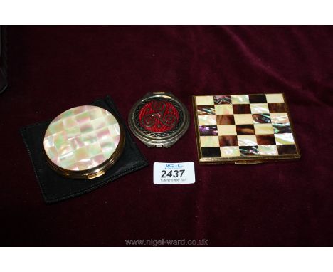 A Stratton mother of pearl Compact (unused), a cigarette/card case with checker board design and a Celtic design double mirro