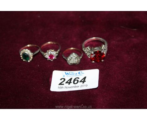 Three 9ct gold/silver dress Rings and a silver Ring.