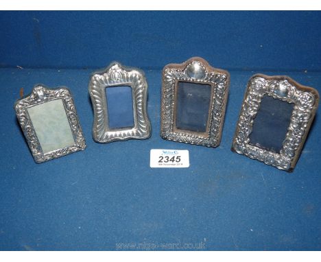 Four Silver photograph Frames.