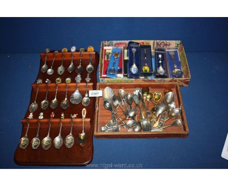 A collection of seventy highly decorated Teaspoons including continental silver, silver plate, etc.