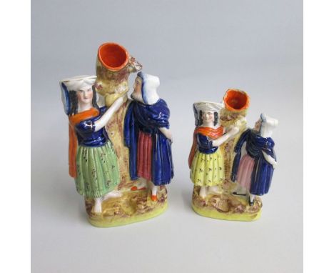 Two Staffordshire Portrait Figures of Rebekah and Abraham’s servant, based on a painting by Horace Vernet of the same subject