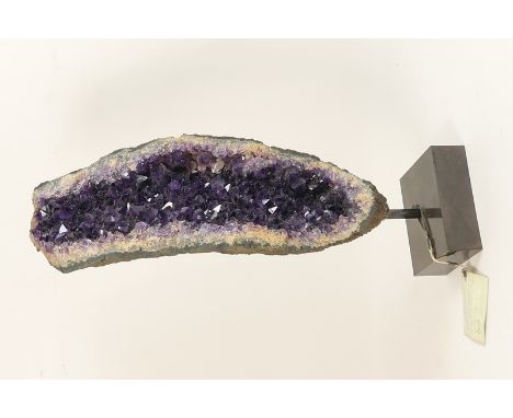 Brazilian amethyst geode, presented on a stand, overall height 60cmProvenance: Purchased from Harrods, 