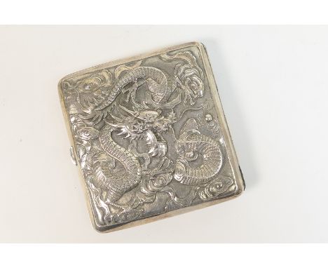 Chinese silver cigarette case, late 19th Century, square form worked on the back with a dragon flying amidst clouds, the fron