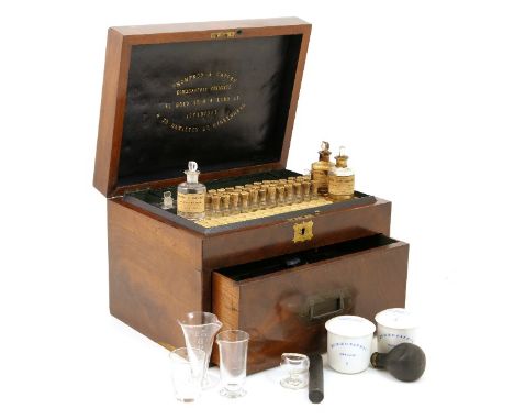 Thompson and Capper mahogany cased homeopathic medicine chest, 19th Century, the mahogany box opening to reveal a partial com
