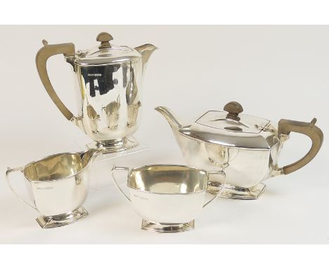 George VI silver four piece tea service, Sheffield 1938, of plain rectangular section over a flared foot, comprising lidded t