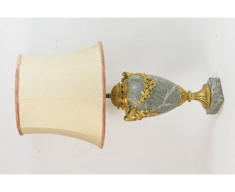 French gilt ormolu and grey marble pedestal table lamp, the ovoid marble body mounted with Bacchanalian masks supporting a fl