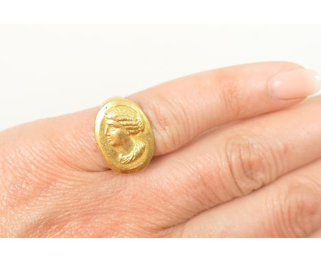 Roman style gold ring, cast with an oval cameo portrait of an Empress, probably Brutta Crispina 164-191A.D., size I, unmarked