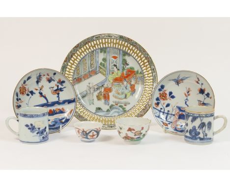 Pair of Chinese Imari saucers, mid 18th Century, decorated with birds amidst branches, 13cm diameter; also two Chinese blue a