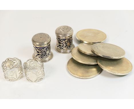 Set of six silver coasters, Birmingham circa 1998, engine turned guilloche decoration, 8.5cm diameter; also a pair of modern 