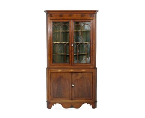 Mahogany and inlaid free standing corner display cabinet, early 19th Century, cavetto cornice over arched astragal glazed doo