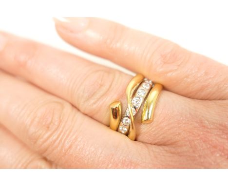 Georg Jensen 'Magic' diamond two colour gold ring designed by Regitze Overgaard, the two piece ring centred with a row of nin