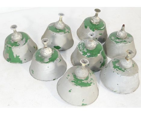 Eight Revo industrial lighting units, six complete with clear glass light domes inside, 37cm diameter