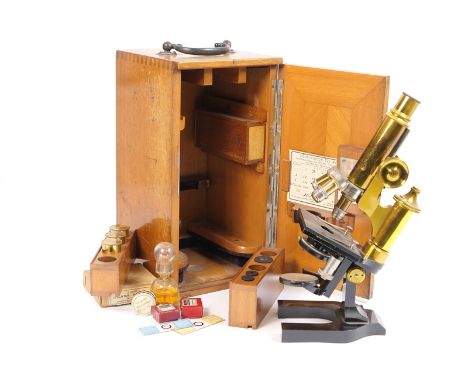 E Leitz, Wetzlar, lacquered brass microscope, circa 1902, 31cm, with additional lenses and accessories, all in original mahog