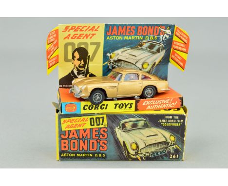 A BOXED CORGI TOYS JAMES BOND ASTON-MARTIN D.B.5, No.261, very lightly playworn, working features, with both bandit figures, 